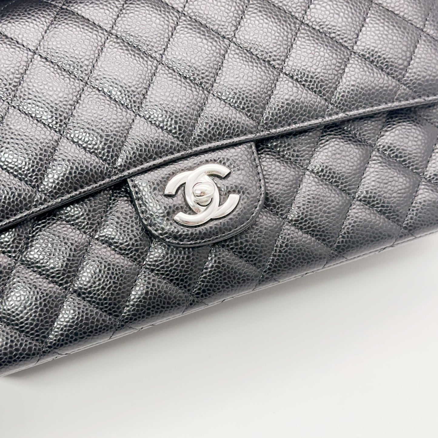 Chanel Classic Maxi Double Flap Bag in Black Caviar Leather with Silver-Tone Hardware [Pre-Owned]