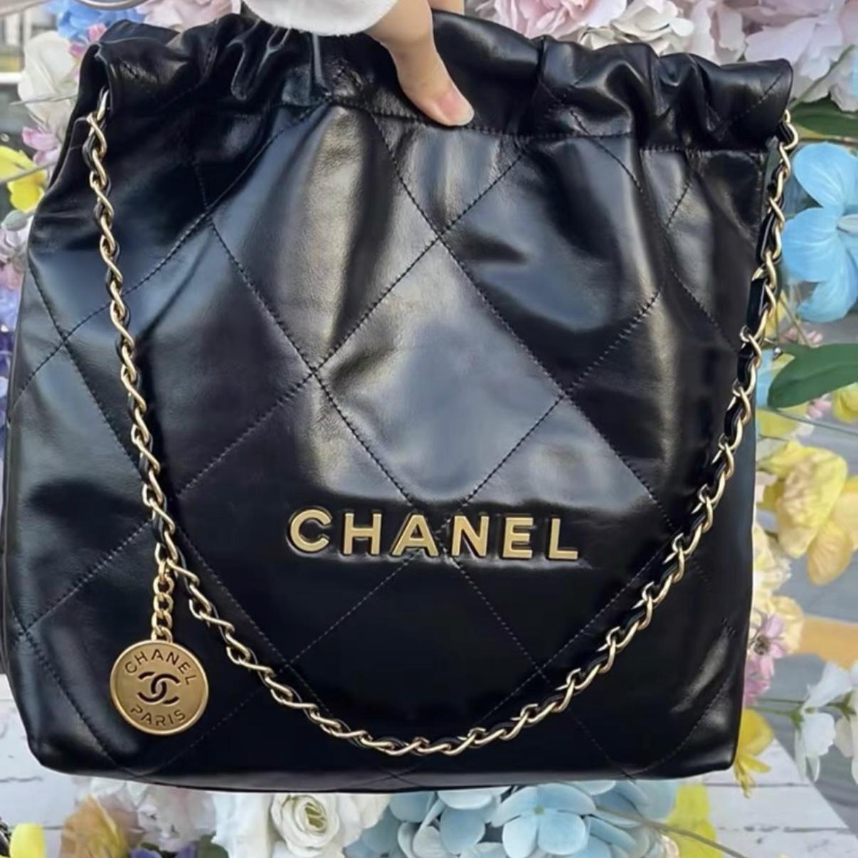 Chanel 22 Small Handbag in Black Calfskin with Gold-Tone Hardware [Pre-Owned]